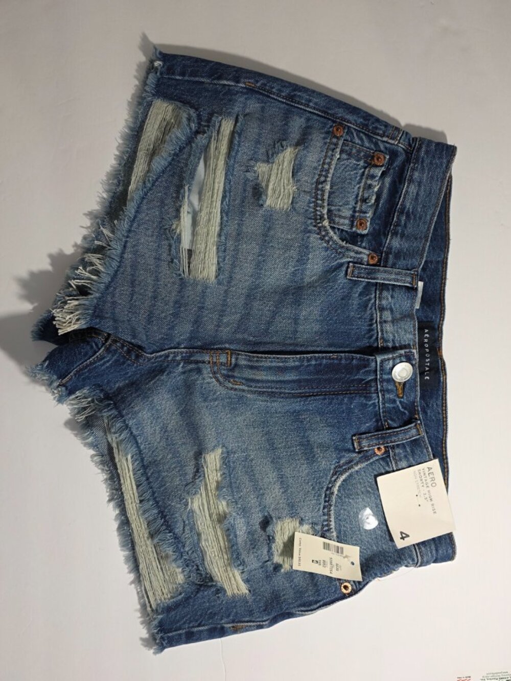 Aero High Rise Distressed Denim Shorty Shorts Size 4 NWT - Picture 2 of 8